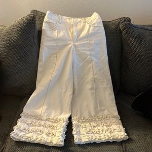 White wide legged ruffled pants/ jean by Cinq a Sept.